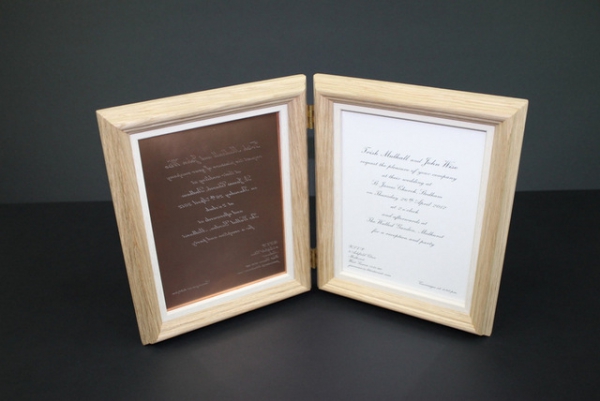 Wedding invitation in a double hinged frame